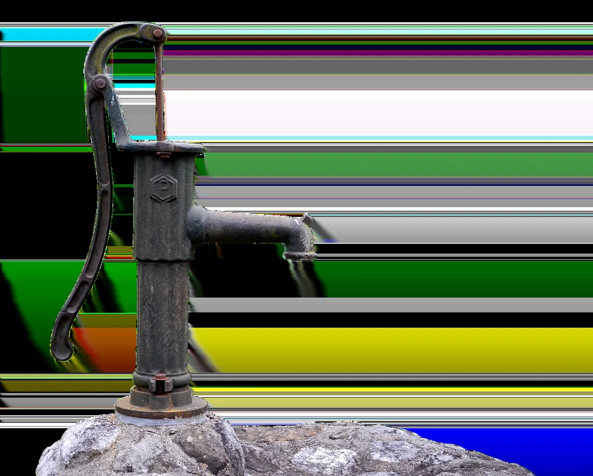 hands unscrewing the clear plastic reservoir of a small unbranded condensate pump, tools nearby on a workbench, no logos